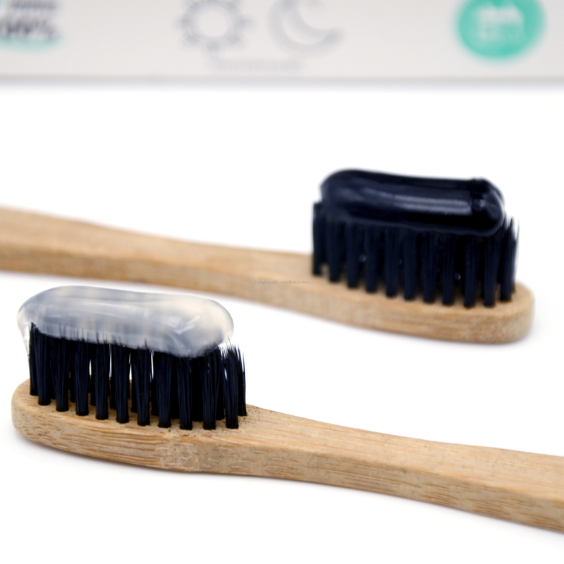 Denti liberi del fluoruro che imbiancano giorno e notte neri del carbone della pasta bianca della noce di cocco del dentifricio in pasta