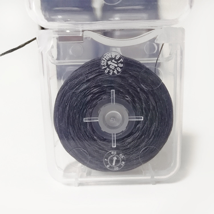 Sapore materiale di nylon portatile della menta dei 50 tester del filo per i denti del carbone del bambù dell'etichetta privata