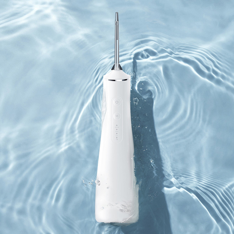 Acqua professionale Flosser di Irrigator di cure odontoiatriche del dispositivo di rimozione della placca batterica della casa IPX7 e di viaggio