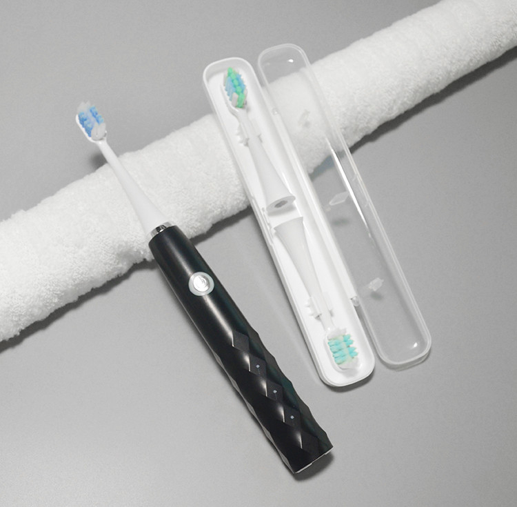 Wholease lungamente dura lo spazzolino da denti elettrico di ricordo astuto impermeabile ricaricabile IPX7 con una testa di 4 spazzole