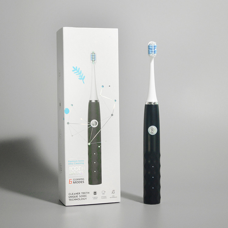 Wholease lungamente dura lo spazzolino da denti elettrico di ricordo astuto impermeabile ricaricabile IPX7 con una testa di 4 spazzole